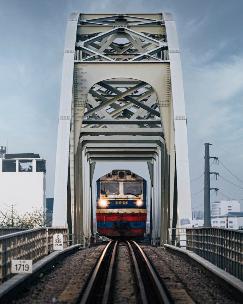 Ho Chi Minh City Transport | How to Get Around Saigon 4 Train beneath the bridge in Binh Loi HCMC. Photo by Jet Dela Cruz - Ho Chi Minh City Transport | How to Get Around Saigon
