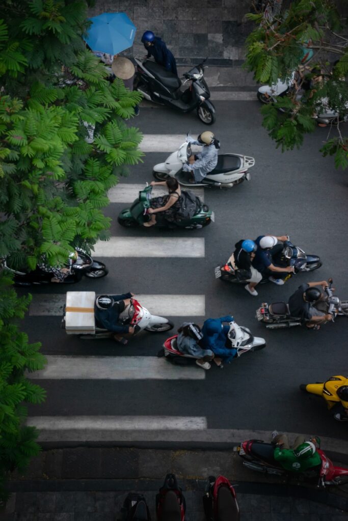 Motorcycles are the popular vehicle in Vietnam. Photo by Filipe Freitas - What To Do In North Vietnam: Navigate Your Dream Itinerary